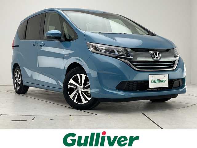 ホンダ フリード ハイブリット G ホンダセンシング 愛知県 2019(令1)年 1.9万km ブルーホライゾンM 純正10型ナビ/フリップダウンモニター/両側パワースライドドア/レーダークルーズコントロール/フルセグ/CD DVD/Bluetooth/バックカメラ/純正アルミホイール/ETC/LEDヘッドライト/レーンキープアシスト/オートマチックハイビーム/ドライブレコーダー/衝突軽減システム/フルセグ/CD DVD/Bluetooth/ステアリングスイッチ/スマートキー/プッシュスタート