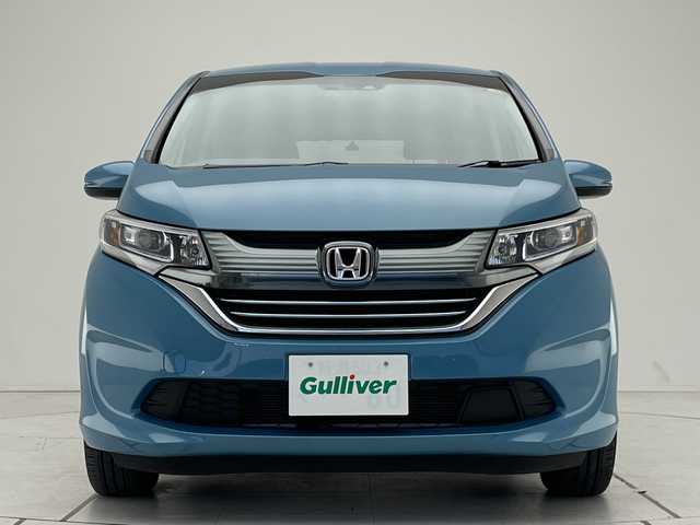 ホンダ フリード ハイブリット G ホンダセンシング 愛知県 2019(令1)年 1.9万km ブルーホライゾンM 純正10型ナビ/フリップダウンモニター/両側パワースライドドア/レーダークルーズコントロール/フルセグ/CD DVD/Bluetooth/バックカメラ/純正アルミホイール/ETC/LEDヘッドライト/レーンキープアシスト/オートマチックハイビーム/ドライブレコーダー/衝突軽減システム/フルセグ/CD DVD/Bluetooth/ステアリングスイッチ/スマートキー/プッシュスタート