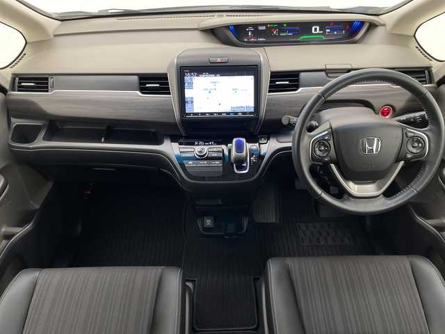 ホンダ フリード ハイブリット G ホンダセンシング 愛知県 2019(令1)年 1.9万km ブルーホライゾンM 純正10型ナビ/フリップダウンモニター/両側パワースライドドア/レーダークルーズコントロール/フルセグ/CD DVD/Bluetooth/バックカメラ/純正アルミホイール/ETC/LEDヘッドライト/レーンキープアシスト/オートマチックハイビーム/ドライブレコーダー/衝突軽減システム/フルセグ/CD DVD/Bluetooth/ステアリングスイッチ/スマートキー/プッシュスタート