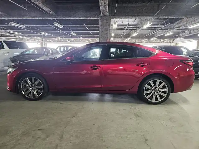 マツダ マツダ６セダン XD Lパッケージ 鹿児島県 2021(令3)年 5.2万km ソウルレッドクリスタルM 純正8型ナビ/フルセグTV/BOSEプレミアムサウンドシステム/レーダークルーズコントロール/パーキングセンサー/衝突被害軽減ブレーキ/車線逸脱防止支援システム/ブラインドスポットモニタリング/交通標識認識機能/ヘッドアップディスプレイ/ツインターボ/LEDヘッドランプ/革巻きステアリング/ステアリングヒーター/パドルシフト/ブラウンナッパ革シート/シートヒーター/前席パワーシート/エアシート/純正19インチアルミホイール/スマートキー/プッシュエンジンスタート/禁煙車