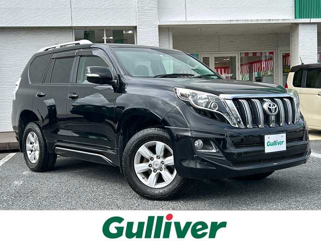 トヨタ ランドクルーザー プラド TX Lパッケージ 千葉県 2015(平27)年 8.3万km ブラック モデリスタエアロ／ウイングデッキ／マフラー　ＳＲ　レザー　メーカーナビ　フルセグ　フロント／サイド／バックカメラ　電動シート　シートヒーター　ルーフレール　１オーナー　寒冷地仕様　７人乗　軽油　過給機