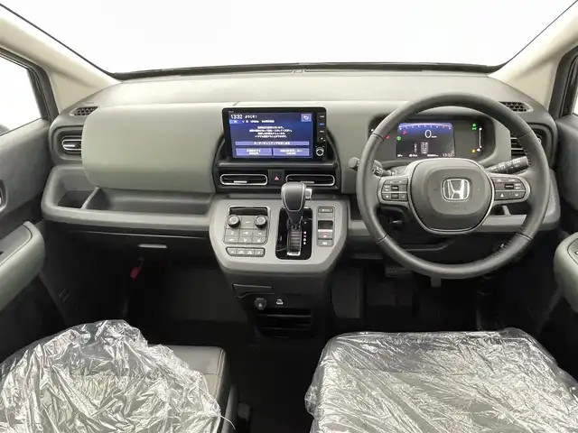 ホンダ フリード クロスター 熊本県 2025(令7)年 0.1万km未満 クリスタルブラックパール 登録済未使用車/純正ナビLXM-242ZFNI（ＡｐｐｌＣａｒＰｌａｙ・ＡｎｄｒｏｉｄＡｕｔｏ・ＢＴ・フルセグ・ＵＳＢ）/バックカメラ　/両側パワースライドドア　/前後クリアランスソナー　/前席シートヒーター　/ホンダセンシング/・衝突軽減ブレーキ/・踏み間違い衝突軽減システム/・急アクセル抑制機能/・路外逸脱抑制機能/・歩行者事故低減ステアリング/・アダブティブクルーズコントロール/・車線維持支援システム/・先行車発進お知らせ/・標識認識システム/・ブラインドスポットモニター/・パーキングサポートブレーキ/・オートマチックハイビーム/横滑り防止/ハーフレザーシート/純正１５インチAW/オートライト/LEDヘッドライト/フォグライト/スマートキー/プッシュスタート/スペアキー1本/取扱説明書