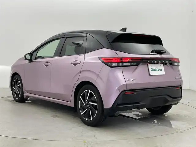 日産 ノート X 富山県 2021(令3)年 1.7万km ピンク 純正ナビ（AM/FM/BT/USB/HDMI/フルセグ）/全方位カメラ/ドライブレコーダー/ETC/デジタルインナーミラー/ブラインドスポットモニター/衝突被害軽減システム/レーダークルーズコントロール/レーンキープアシスト/コーナーセンサー/横滑り防止装置/アイドリングストップ/純正アルミホイール/純正フロアマット/オートLEDライト/オートマチックハイビーム/置くだけ充電/スマートキー