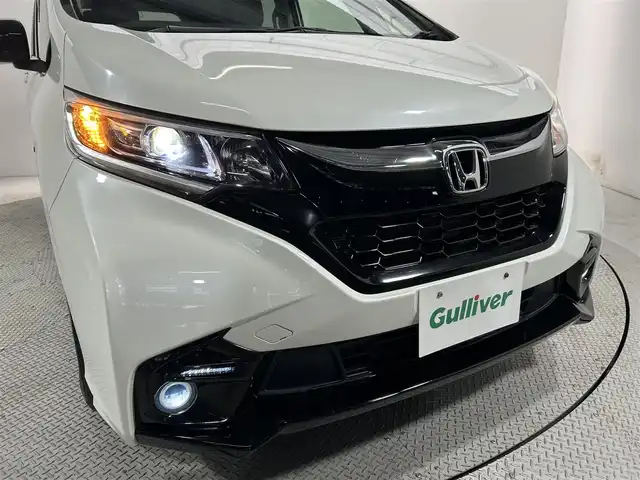 ホンダ フリード ハイブリット モデューロX ホンダセンシング 大阪府 2018(平30)年 6.5万km ホワイトオーキッドパール 純正9インチナビTV 両側パワースライドドア 衝突軽減 レーダークルコン ハーフレザー オートライト ドラレコ スマートキー プッシュスタート