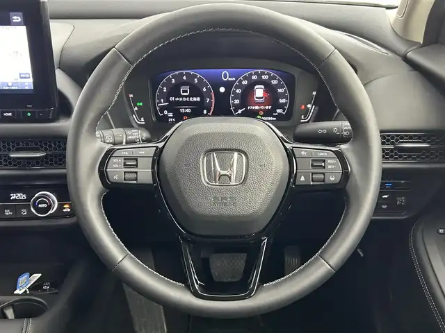 ホンダ ＺＲ－Ｖ X 道央・札幌 2024(令6)年 0.6万km プラチナホワイトパール ・４WD/・コンフォートビューパッケージ/・Honda CONNECT for Gathers＋ナビ装着用スペシャルパッケージ/・CD/DVD/SD/BT/Apple CarPlay/フルセグ/・バックカメラ/・ETC2.0/・純正ドライブレコーダー/・ホンダセンシング/・衝突軽減ブレーキ/・誤発進抑制機能/後方誤発進抑制機能/・車線維持支援システム/・渋滞追従機能付アダプティブクルーズコントロール/・パーキングセンサーシステム/・オートブレーキホールド/・ヒルディセントコントロール/・オートマチックハイビーム/・LEDヘッドライト/・ハーフレザーシート/・前席シートヒーター/・パワーバックドア/・純正18インチAW/・純正18インチAW夏タイヤ積込（4323、8分山）/・純正フロアマット/・取扱説明書