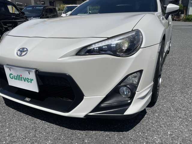 トヨタ ８６ GT 埼玉県 2013(平25)年 5.2万km サテンホワイトパール ・TRDエアロ/・HKSマフラー/・HKSサスペンション/・HKSタワーバー/・HKSマフラー/・ADVAN Racing RGIII 18インチAW/・HKSフラッシュエディター/・アルパインナビ/・バックカメラ/・プッシュスタート/・スマートキー×２/・革巻きステアリング/・電格ミラー/・オートライト/・フォグライト/・ワンオーナー/・ディーラー点検記録簿/・取扱説明書/・保証書/・純正AW積込み