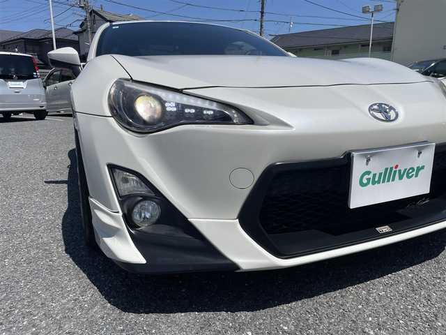トヨタ ８６ GT 埼玉県 2013(平25)年 5.2万km サテンホワイトパール ・TRDエアロ/・HKSマフラー/・HKSサスペンション/・HKSタワーバー/・HKSマフラー/・ADVAN Racing RGIII 18インチAW/・HKSフラッシュエディター/・アルパインナビ/・バックカメラ/・プッシュスタート/・スマートキー×２/・革巻きステアリング/・電格ミラー/・オートライト/・フォグライト/・ワンオーナー/・ディーラー点検記録簿/・取扱説明書/・保証書/・純正AW積込み