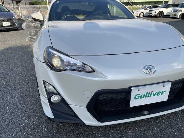 トヨタ ８６ GT 埼玉県 2013(平25)年 5.2万km サテンホワイトパール ・ディーラー点検記録簿/・ワンオーナー/・TRDエアロ/・HKSマフラー/・HKSサスペンション/・HKSタワーバー/・HKSマフラー/・ADVAN Racing RGIII 18インチAW/・純正アルミ車載/・HKSフラッシュエディター/・アルパインナビ/・バックカメラ/・プッシュスタート/・スマートキー×２/・革巻きステアリング/・電格ミラー/・オートライト/・フォグライト/・保証書/・取扱説明書