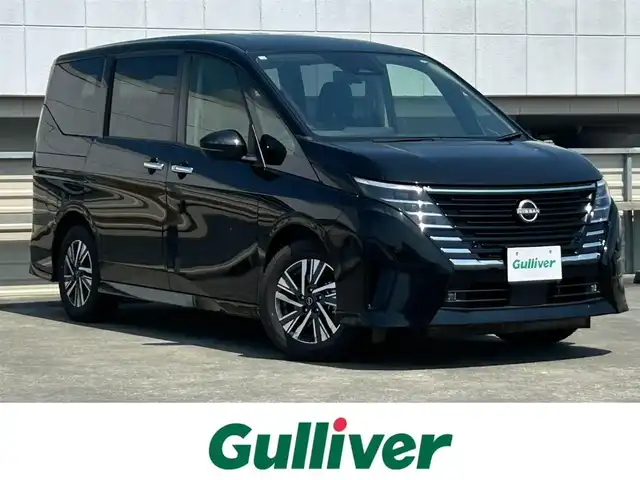 日産 セレナ ハイウェイスター V 静岡県 2023(令5)年 5.1万km ダイヤモンドブラック 純正メモリナビ/（BT/FM/AM/フルセグTV）/アラウンドビューモニター/ステアリングスイッチ/パドルシフト/デジタルインナーミラー/ワイヤレス充電/両側パワースライドドア/ブラインドスポットモニター/ハンズフリーオートスライドドア/サンシェード/ウィンカーミラー/電格ミラー/ETC2.0/取扱説明書/保証書