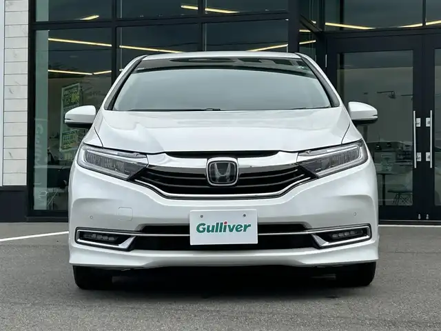 ホンダ シャトル ハイブリッド X ホンダセンシング 愛媛県 2020(令2)年 3.6万km プラチナホワイトパール 純正8型ナビ/バックカメラ/半革温シート/アダプティブクルーズコントロール/衝突被害軽減装置/車線逸脱防止装置/クリアランスソナー/パドルシフト/フロントワイパーデアイサー/前後ドライブレコーダー/LEDヘッドライト/電格ミラー/ヒートミラー/ステアリングリモコン/純正ラバーマット/ISOFIX/シガーソケット/現状サマー(純正AW)(185/60R15)/BRIDGESTONE EcoPia EP150