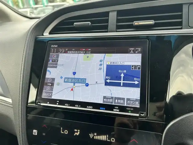 ホンダ シャトル ハイブリッド X ホンダセンシング 愛媛県 2020(令2)年 3.6万km プラチナホワイトパール 純正8型ナビ/バックカメラ/半革温シート/アダプティブクルーズコントロール/衝突被害軽減装置/車線逸脱防止装置/クリアランスソナー/パドルシフト/フロントワイパーデアイサー/前後ドライブレコーダー/LEDヘッドライト/電格ミラー/ヒートミラー/ステアリングリモコン/純正ラバーマット/ISOFIX/シガーソケット/現状サマー(純正AW)(185/60R15)/BRIDGESTONE EcoPia EP150