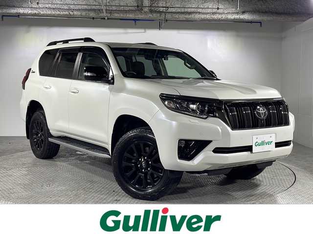 トヨタ ランドクルーザー プラド TX-L 70thアニバーサリーLTD 沖縄県 2022(令4)年 2.2万km ホワイトパールクリスタルシャイン 禁煙車　/７人乗り　/（純正ナビ　フルセグＴＶ　Ｂｌｕｅｔｏｏｔｈ）　/サンルーフ　/全方位カメラ　/ビルトインＥＴＣ２．０　/電動格納サードシート　/前後ドライブレコーダー　/ブラインドスポットモニター　/ベージュレザーシート/パワーシート/シートヒーター、エアーシート/ブラインドスポットモニター/Toyota Safety Sense/・プリクラッシュセーフティー/・レーンディパチャーアラート/・オートマチックハイビーム/レーダークルーズコントロール