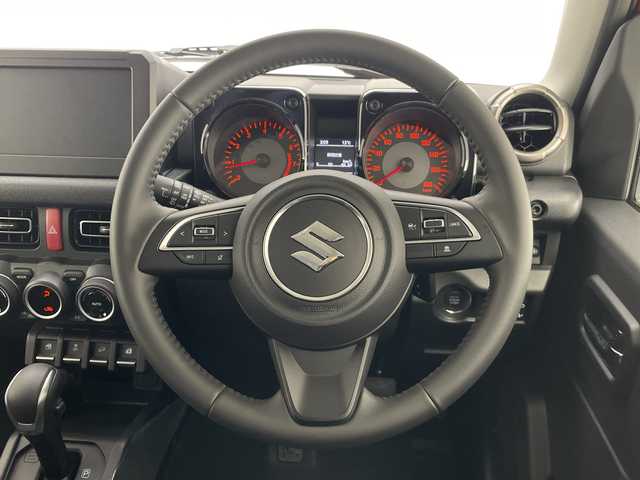 スズキ ジムニー ノマド FC 愛知県 2025(令7)年 0.1千km 赤 登録済未使用車/レーダークルーズコントロール/シートヒーター/純正アルミホイール/LEDヘッドライト/レーンキープアシスト/ダウンヒルアシストコントロール/オートマチックハイビーム/衝突軽減システム/ステアリングスイッチ/スマートキー/プッシュスタート