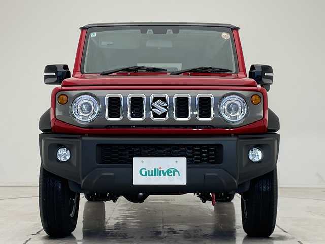 スズキ ジムニー ノマド FC 愛知県 2025(令7)年 0.1千km 赤 登録済未使用車/レーダークルーズコントロール/シートヒーター/純正アルミホイール/LEDヘッドライト/レーンキープアシスト/ダウンヒルアシストコントロール/オートマチックハイビーム/衝突軽減システム/ステアリングスイッチ/スマートキー/プッシュスタート