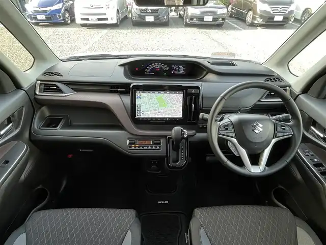 スズキ ソリオ バンディット HV SV 埼玉県 2023(令5)年 1.2万km ピュアホワイトP 純正10インチナビ/純正前後ドライブレコーダー/両側パワースライドドア/衝突被害軽減システム/レーンキープアシスト/後方コーナーセンサー/全方位カメラ/バックカメラ/フロントカメラ/サイドカメラ/レーダークルーズコントロール/ビルトインETC/シートヒーター/フルセグTV/Bluetooth/CD、DVD/LEDヘッドライト/フォグランプ/オートライト/オートマチックハイビーム/純正アルミホイール/純正フロアマット/プッシュスタート/スマートキー
