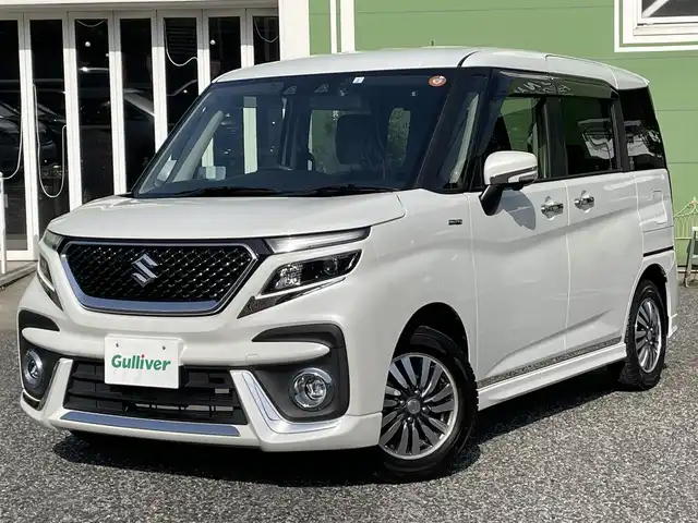 スズキ ソリオ バンディット HV SV 埼玉県 2023(令5)年 1.2万km ピュアホワイトP 純正10インチナビ/純正前後ドライブレコーダー/両側パワースライドドア/衝突被害軽減システム/レーンキープアシスト/後方コーナーセンサー/全方位カメラ/バックカメラ/フロントカメラ/サイドカメラ/レーダークルーズコントロール/ビルトインETC/シートヒーター/フルセグTV/Bluetooth/CD、DVD/LEDヘッドライト/フォグランプ/オートライト/オートマチックハイビーム/純正アルミホイール/純正フロアマット/プッシュスタート/スマートキー