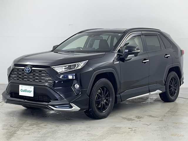 トヨタ ＲＡＶ４ ハイブリットG 道央・札幌 2019(令1)年 6.5万km アティチュードブラックマイカ ・ワンオーナー/・寒冷地仕様/・純正ナビ&CD&BT&SD/・パワーバックドア/・バックカメラ/・トヨタセーフティセンス/・プリクラッシュセーフティ/・レーントレーシングアシスト/・レーダークルーズコントロール/・ロードサインアシスト/・インテリジェントクリアランスソナー/・リヤクロストラフィックオートブレーキ/・ブラインドスポットモニター/・先行車発進お知らせ機能/・車両接近通報装置/・おくだけ充電/・D席メモリー付パワーシート/・前席シートヒーター/・合皮シート/・ステアリングヒーター/・フロントワイパーデアイサー/・AC100V/・モデリスタエアロ/・純正フロアマット/・電動格納ミラー/・プッシュスタート/・LEDヘッドライト/・リアフォグランプ/・オートライト/・スマートキー/・純正18インチAW夏タイヤ積込/・保証書/・取扱説明書