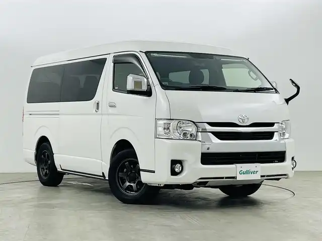 トヨタ ハイエース ファインテックツアラー 福島県 2021(令3)年 3.3万km ホワイトパールクリスタルシャイン ワンオーナー/社外フリップダウンモニター/社外メモリーナビゲーション/型式：AVIC-CW910/【AM/FM/CD/DVD/Bluetooth/フルセグTV】/・AC100v電源/・全方位モニター/・デジタルインナーミラー/・社外ETC/プリクラッシュセーフティ/クルーズコントロール/車線逸脱警報装置/前後コーナーセンサー/両側パワースライドドア/ステアリングスイッチ/社外RSレーダー/RAYS16インチアルミホイール/LEDヘッドライト/・オートライト/・フロントフォグライト/プッシュスタート/・スマートキー/・スペアキー/取扱説明書/・保証書
