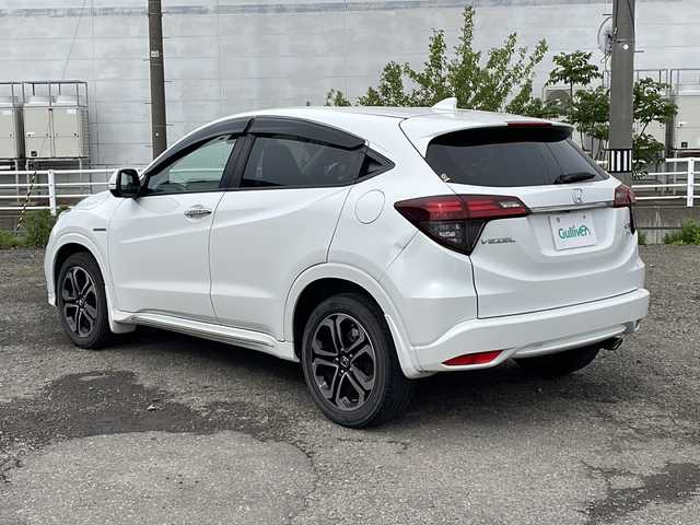 ホンダ ヴェゼル ハイブリッド Z ホンダセンシング 新潟県 2019(平31)年 4.8万km プラチナホワイトパール 4WD/純正SDナビ(VXM-195VFi)/CD/DVD/BT/フルセグテレビ/SDミュージックサーバー/バックカメラ/ETC/ドライブレコーダー/衝突被害軽減ブレーキ/レーンキープアシスト/レーダークルーズコントロール/半革シート/シートヒーター /パドルシフト/ステアリングスイッチ/スマートキー/プッシュスタート/LEDヘッドライト/オートライト/フォグランプ/純正17インチアルミホイール