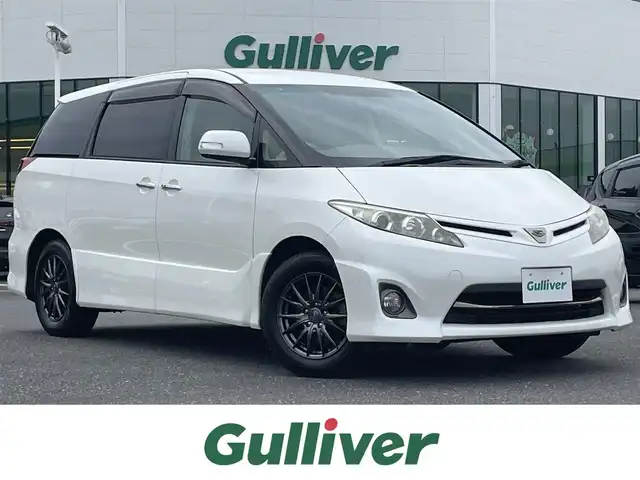 トヨタ エスティマ アエラス Gエディション 島根県 2011(平23)年 8.9万km ホワイトパールクリスタルシャイン 純正ナビ/CD/DVD/DTV/Bluetooth/バックカメラ/純正フリップダウンモニター/両側パワースライドドア /クルーズコントロール/HIDオートライト/ビルトインETC/前後ドライブレコーダー/AW付きサマータイヤ積込(要交換)/社外16インチアルミホイール/HIDオートライト/スマートキー/プッシュスタート /純正フロアマット/ドアバイザー