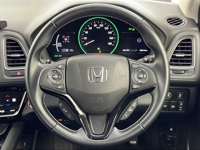 ホンダ ヴェゼル ハイブリッド Z ホンダセンシング 愛知県 2019(平31)年 5.9万km ミッドナイトブルービームM 禁煙/スペアキー/純正ナビ/・フルセグ/・Bluetooth/・DVD/・CD/ビルトインETC2.0/バックカメラ/電動パーキングブレーキ/オートブレーキホールド/追従型クルコン/ABS/横滑り防止装置/衝突軽減ブレーキ/誤発進抑制装置/車線逸脱抑制装置/先行者発進お知らせ装置/車線維持支援システム/標識認識機能/歩行者事故低減ステアリング/前席シートヒータ/ハーフレザーシート/純正フロアマット/LEDヘッドライト/オートライト/電動格納ミラー/取扱説明書