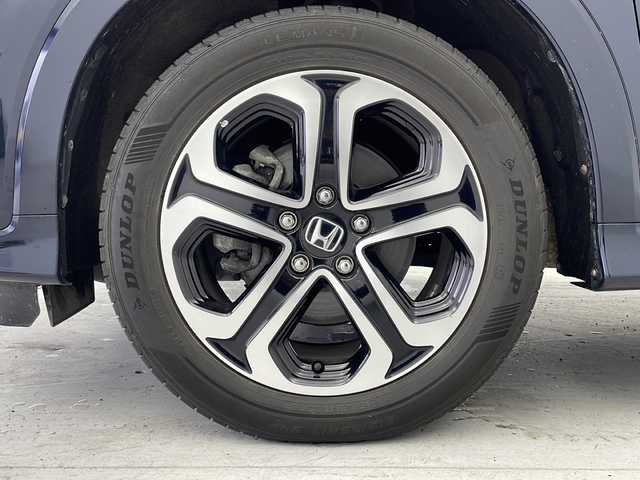 ホンダ ヴェゼル ハイブリッド Z ホンダセンシング 愛知県 2019(平31)年 5.9万km ミッドナイトブルービームM 禁煙/スペアキー/純正ナビ/・フルセグ/・Bluetooth/・DVD/・CD/ビルトインETC2.0/バックカメラ/電動パーキングブレーキ/オートブレーキホールド/追従型クルコン/ABS/横滑り防止装置/衝突軽減ブレーキ/誤発進抑制装置/車線逸脱抑制装置/先行者発進お知らせ装置/車線維持支援システム/標識認識機能/歩行者事故低減ステアリング/前席シートヒータ/ハーフレザーシート/純正フロアマット/LEDヘッドライト/オートライト/電動格納ミラー/取扱説明書