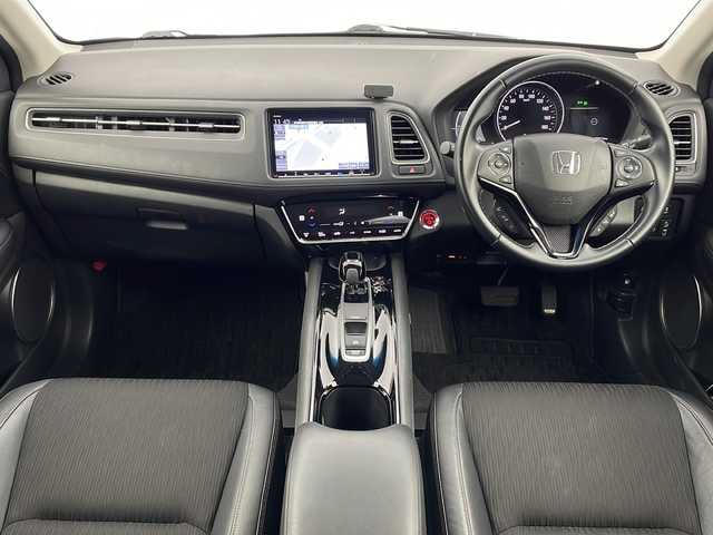 ホンダ ヴェゼル ハイブリッド Z ホンダセンシング 愛知県 2019(平31)年 5.9万km ミッドナイトブルービームM 禁煙/スペアキー/純正ナビ/・フルセグ/・Bluetooth/・DVD/・CD/ビルトインETC2.0/バックカメラ/電動パーキングブレーキ/オートブレーキホールド/追従型クルコン/ABS/横滑り防止装置/衝突軽減ブレーキ/誤発進抑制装置/車線逸脱抑制装置/先行者発進お知らせ装置/車線維持支援システム/標識認識機能/歩行者事故低減ステアリング/前席シートヒータ/ハーフレザーシート/純正フロアマット/LEDヘッドライト/オートライト/電動格納ミラー/取扱説明書
