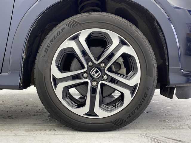 ホンダ ヴェゼル ハイブリッド Z ホンダセンシング 愛知県 2019(平31)年 5.9万km ミッドナイトブルービームM 禁煙/スペアキー/純正ナビ/・フルセグ/・Bluetooth/・DVD/・CD/ビルトインETC2.0/バックカメラ/電動パーキングブレーキ/オートブレーキホールド/追従型クルコン/ABS/横滑り防止装置/衝突軽減ブレーキ/誤発進抑制装置/車線逸脱抑制装置/先行者発進お知らせ装置/車線維持支援システム/標識認識機能/歩行者事故低減ステアリング/前席シートヒータ/ハーフレザーシート/純正フロアマット/LEDヘッドライト/オートライト/電動格納ミラー/取扱説明書