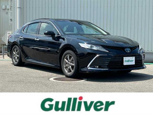 トヨタ カムリ G 富山県 2021(令3)年 1.4万km アティチュードブラックマイカ 純正ナビ/フルセグTV/純正17インチAW(215/55/R17)積み込み/社外16インチAWスタッドレスタイヤ/バックカメラ/Bluetooth/ドライブレコーダー/ETC/パワーシート(D席)/パワーバックドア/プリクラッシュセーフティ/レーダークルーズコントロール/LEDヘッドランプ/プッシュスタート/フォグランプ/スマートキー/スペアキー/LTA(レーントレーシングアシスト)/ドライバー異常時対応システム/オートマチックハイビーム/RSA(ロードサインアシスト)/BSM(ブラインドスポットモニター)/RCTA(リアクロストラフィックアラート)/パーキングアシスト/先行車発進告知/電動パーキングブレーキ/TPWS(タイヤ空気圧警報システム)/ステアリングスイッチ