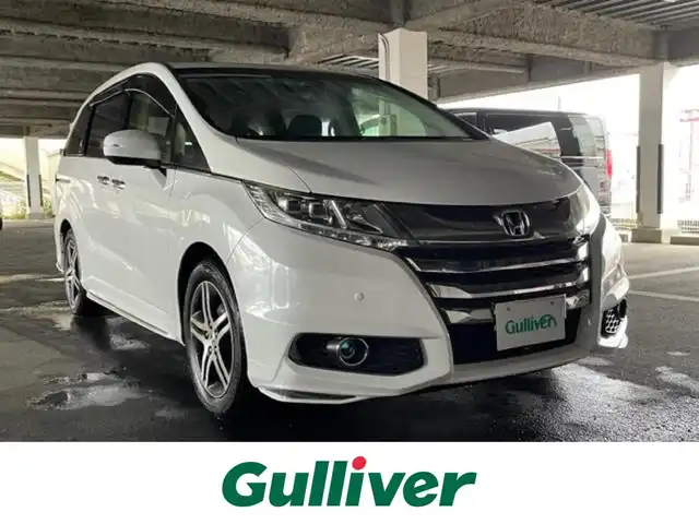 ホンダ オデッセイ アブソルート 20thアニバーサリー 茨城県 2015(平27)年 6.9万km パール 社外ＳＤナビ　/-BT/AM/FM/フルセグTV/クルーズコントロール　/バックカメラ/ＥＴＣ　/ドライブレコーダー　/アイドリングストップ　/パーキングアシスト　/両側パワースライドドア　/ハーフレザーシート　/D席パワーシート　/コーナーセンサー前後/純正フロアマット/純正アルミホイール/ウォークスルー/カーテンエアバッグ