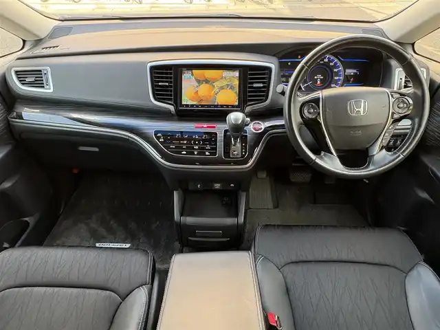 ホンダ オデッセイ ハイブリッド 愛知県 2017(平29)年 4.5万km クリスタルブラックパール ワンオーナー/ホンダセンシング車/両側パワースライドドア/アルパインフィリップダウンモニター/クルコン/パワーシート/純正ナビ/フルセグテレビ/Bluetooth/ビルトインETC/ドラレコ前後/ハーフレザーシート/ブラインドスポットインフォメーション（側後方検知機能）/CMBS/LKAS/AC100V/バックカメラ/純正アルミホイール/純正マット/プッシュスタート/取説、保証書あります。