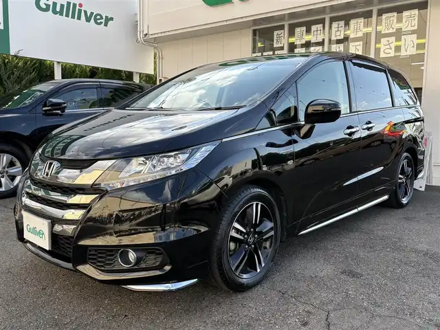 ホンダ オデッセイ ハイブリッド 愛知県 2017(平29)年 4.5万km クリスタルブラックパール ワンオーナー/ホンダセンシング車/両側パワースライドドア/アルパインフィリップダウンモニター/クルコン/パワーシート/純正ナビ/フルセグテレビ/Bluetooth/ビルトインETC/ドラレコ前後/ハーフレザーシート/ブラインドスポットインフォメーション（側後方検知機能）/CMBS/LKAS/AC100V/バックカメラ/純正アルミホイール/純正マット/プッシュスタート/取説、保証書あります。