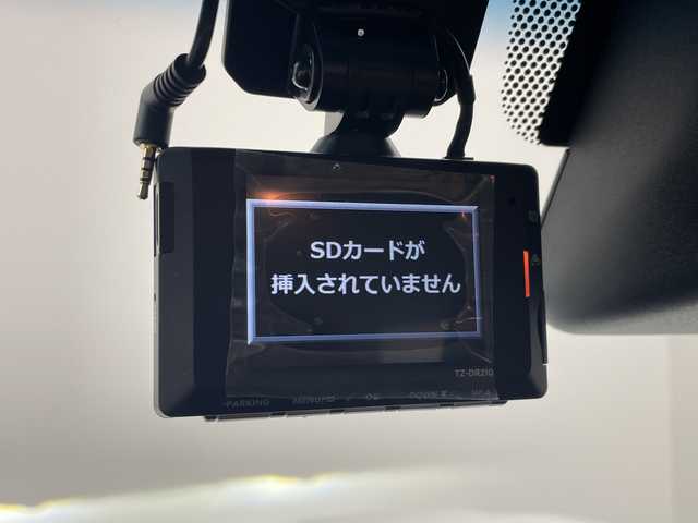 トヨタ ランドクルーザー AX 群馬県 2024(令6)年 1.8万km スーパーホワイトⅡ 純正ナビ　バックカメラ　フルセグＴＶ　電動デフロック　ＥＴＣ　前後ドラレコ　ＬＥＤヘッドライト　ハーフレザーシート　クルーズコントロール　ウッドコンビステアリング　衝突被害軽減ブレーキ　禁煙車