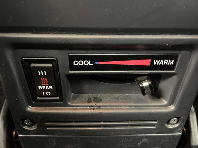 トヨタ ランドクルーザー AX 群馬県 2024(令6)年 1.8万km スーパーホワイトⅡ 純正ナビ　バックカメラ　フルセグＴＶ　電動デフロック　ＥＴＣ　前後ドラレコ　ＬＥＤヘッドライト　ハーフレザーシート　クルーズコントロール　ウッドコンビステアリング　衝突被害軽減ブレーキ　禁煙車