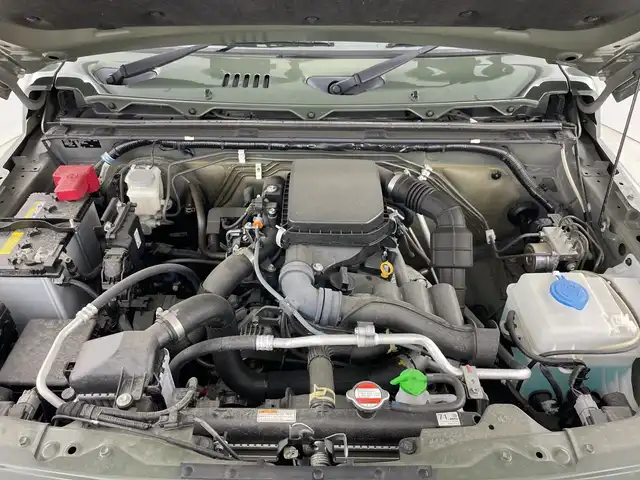 スズキ ジムニー XC 愛知県 2022(令4)年 1.5万km ジャングルグリーン 純正ディスプレイオーディオ(PVH-9300DVSZS)/DISC/Bluetooth/USB/バックモニター/ビルトインＥＴＣ/ドライブレコーダー/衝突軽減ブレーキ/横滑り防止装置/前席シートヒーター/クルーズコントロール/レーンキープアシスト/ステアリングスイッチ/ダウンヒルアシストコントロール/アイドリングストップ/オートマチックハイビーム/前後ドライブレコーダー/純正16インチアルミホイール/純正フロアマット/プッシュスタート/スマートキー/ＬＥＤライト