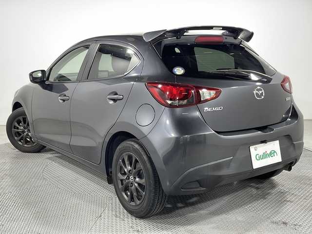 マツダ デミオ 13S 広島県 2016(平28)年 6.8万km メテオグレーマイカ 禁煙/マツダコネクトナビ/・Ｂｌｕｅｔｏｏｔｈ接続/・ＣＤ／ＤＶＤ／ＴＶ再生/バックカメラ/リアウィング/ＥＴＣ　/衝突軽減ブレーキ　/横滑り抑制/純正フロアマット　/カーテンエアバッグ/アイドリングストップ