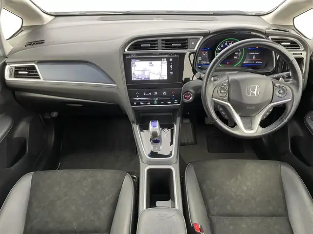ホンダ シャトル ハイブリッド X 富山県 2015(平27)年 7.4万km ホワイトオーキッドパール 純正ナビ（CD DVD bluetooth）/フルセグTV/HDMI/バックカメラ/ビルトインETC/フロントドラレコ（DRY-AS350GS）/純正15インチAW/15インチスタッドレスセット積込み/パドルシフト/ハーフレザーシート/オートライト/LEDヘッドライト/スマートキー/プッシュスタート/クルーズコントロール/横滑防止装置/純正マット/保証書/スペアキー