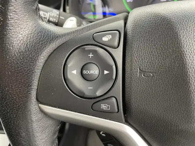 ホンダ シャトル ハイブリッド X 富山県 2015(平27)年 7.4万km ホワイトオーキッドパール 純正ナビ（CD DVD bluetooth）/フルセグTV/HDMI/バックカメラ/ビルトインETC/フロントドラレコ（DRY-AS350GS）/純正15インチAW/15インチスタッドレスセット積込み/パドルシフト/ハーフレザーシート/オートライト/LEDヘッドライト/スマートキー/プッシュスタート/クルーズコントロール/横滑防止装置/純正マット/保証書/スペアキー