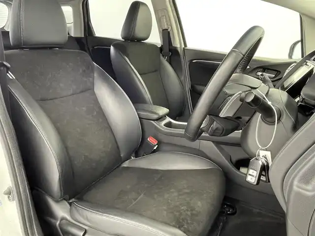 ホンダ シャトル ハイブリッド X 富山県 2015(平27)年 7.4万km ホワイトオーキッドパール 純正ナビ（CD DVD bluetooth）/フルセグTV/HDMI/バックカメラ/ビルトインETC/フロントドラレコ（DRY-AS350GS）/純正15インチAW/15インチスタッドレスセット積込み/パドルシフト/ハーフレザーシート/オートライト/LEDヘッドライト/スマートキー/プッシュスタート/クルーズコントロール/横滑防止装置/純正マット/保証書/スペアキー