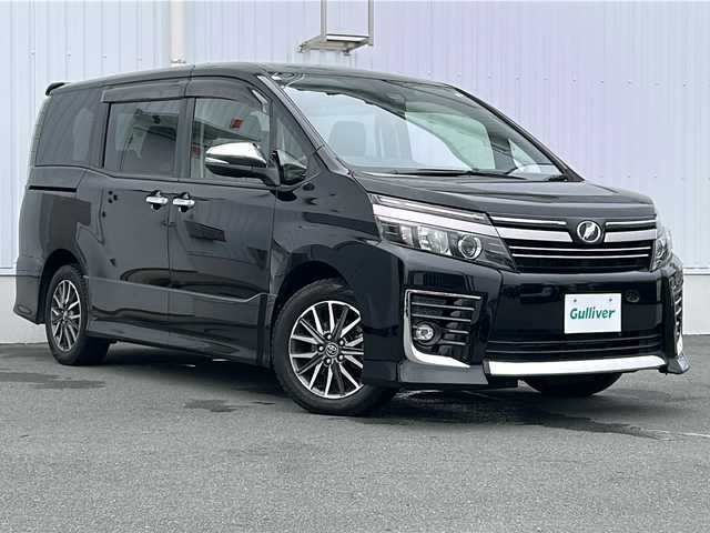 トヨタ ヴォクシー ZS 煌Ⅱ 三重県 2016(平28)年 4.1万km ブラック 純正9型ナビ /バックカメラ /両側パワースライドドア/スペアキー /ビルトインETC /レーンキープアシスト /衝突軽減ブレーキ/ウォークスルー /オートハイビーム /オートライト /フロアマット /リヤサンシェード /電動格納ミラー /禁煙車