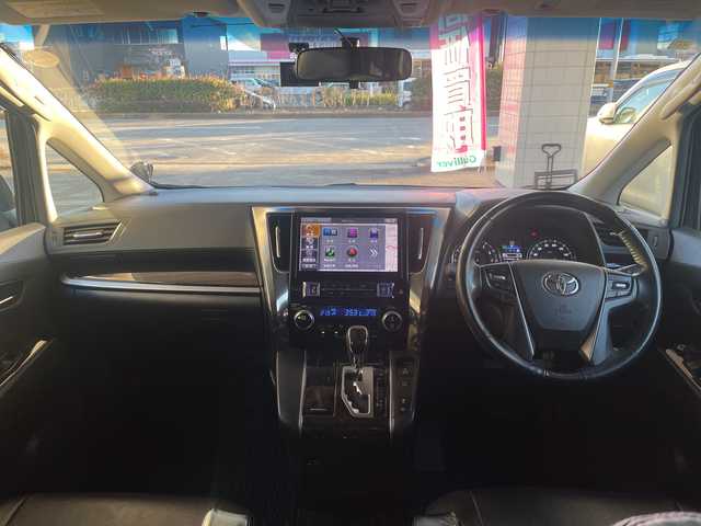 トヨタ ヴェルファイア Z 愛知県 2015(平27)年 13.1万km バーニングブラッククリスタルシャインガラスフレーク ワンオーナー/アルパイン製10型ナビ/アルパイン製後席モニター/フルセグTV・CD・DVD・SD・Bluetooth/革調シートカバー/クリアランスソナー/nanoeエアコン/LEDヘッドライト/LEDフォグランプ/オートライト/ステアリングスイッチ/ETC/前側ドラレコ/純正フロアマット/VIPERセキュリティモデル３３００V/保証書/取扱説明書/スペアスマートキー/ディーラー点検記録簿（H30 R2 R4 R5 R6)