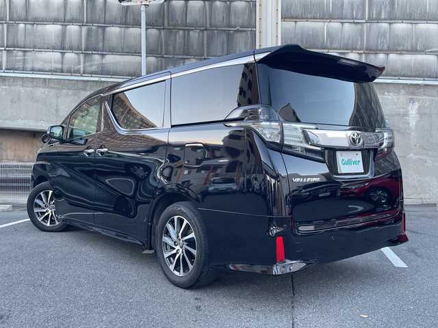 トヨタ ヴェルファイア Z 愛知県 2015(平27)年 13.1万km バーニングブラッククリスタルシャインガラスフレーク ワンオーナー/アルパイン製10型ナビ/アルパイン製後席モニター/フルセグTV・CD・DVD・SD・Bluetooth/革調シートカバー/クリアランスソナー/nanoeエアコン/LEDヘッドライト/LEDフォグランプ/オートライト/ステアリングスイッチ/ETC/前側ドラレコ/純正フロアマット/VIPERセキュリティモデル３３００V/保証書/取扱説明書/スペアスマートキー/ディーラー点検記録簿（H30 R2 R4 R5 R6)