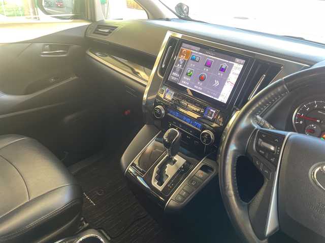 トヨタ ヴェルファイア Z 愛知県 2015(平27)年 13.1万km バーニングブラッククリスタルシャインガラスフレーク ワンオーナー/アルパイン製10型ナビ/アルパイン製後席モニター/フルセグTV・CD・DVD・SD・Bluetooth/革調シートカバー/クリアランスソナー/nanoeエアコン/LEDヘッドライト/LEDフォグランプ/オートライト/ステアリングスイッチ/ETC/前側ドラレコ/純正フロアマット/VIPERセキュリティモデル３３００V/保証書/取扱説明書/スペアスマートキー/ディーラー点検記録簿（H30 R2 R4 R5 R6)