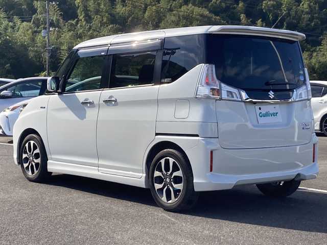 スズキ ソリオ バンディット Fリミテッド 佐賀県 2017(平29)年 4.6万km ピュアホワイトP Carrozzeria8インチナビ/Carrozzeriaフリップダウンモニター/バックカメラ/両側パワースライドドア/デュアルカメラブレーキサポート/路線逸脱警報/クルーズコントロール/ハーフレザーシート/シートヒーター/ETC/ステアリングリモコン/ドライブレコーダー/アイドリングストップ/プッシュスタート/スマートキー/LEDヘッドライト/フォグライト/純正アルミホイール