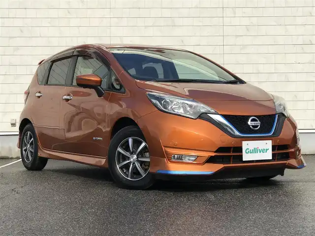 日産 ノート e－パワー X 富山県 2016(平28)年 6.1万km プレミアムコロナオレンジ 純正ナビ/フルセグTV/アラウンドビューモニター/ビルトインETC/ドライブレコーダー/フロント/バックソナー/エマージェンシーブレーキ/車線逸脱警報/オートライト/オートエアコン/ステアリングスイッチ/社外14インチアルミホイール/スマートキー/プッシュエンジンスターター/禁煙車