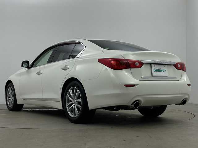 日産 スカイライン 200GT－t 鹿児島県 2014(平26)年 0.3万km クリスタルホワイトパール 純正ナビ/(BT/AM/FM/CD/DVD/フルセグTV)/バックカメラ/クルーズコントロール/ハーフレザーシート/前席パワーシート/ハーフレザーシート/純正LEDヘッドライト/ETC/革巻きステアリング/パドルシフト/ターボ/純正リモコンエンジンスターター/スペアキー/保証書/取扱説明書/ワンオーナー