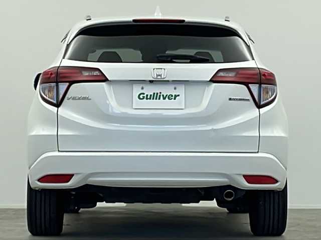 ホンダ ヴェゼル ハイブリッド Z ホンダセンシング 大阪府 2016(平28)年 3.5万km ホワイトオーキッドパール 純正SDナビ/【BT/フルセグTV/HDMI/USB/AUX/ipod/DVD】/バックカメラ/ETC/ドライブレコーダー前後/衝突被害軽減システム/クルーズコントロール追従/レーンキープアシスト/先行車発進アラーム/オートライト/LEDライト/パドルシフト/BRAKEHOLD/ハーフレザーシート/シートヒーター/純正17インチAW/純正フロアマット/スマートキー