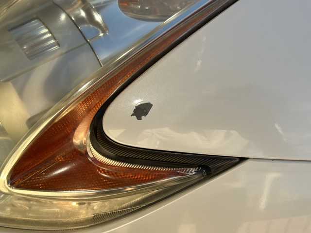 日産 フェアレディ Ｚ バージョンT 静岡県 2010(平22)年 4.1万km ブリリアントホワイトパール 純正メモリナビ/・CD/・DVD/・フルセグＴＶ/・AM/・FM/主要装備/・バックカメラ/・BOSEプレミアムサウンド/・FUJIRSUBIマフラー/・ハーフレザーシート/・シートヒーターD/N席/・パワーシートD/N席/・パドルシフト/・ステリモ/・キセノンヘッドライト/・オートライト/・スマートキー/・プッシュスタート/・純正フロアマット/・純正アルミホイール