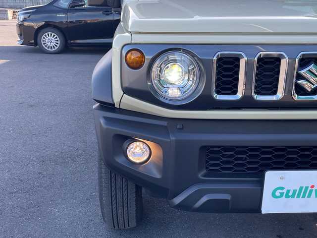 スズキ ジムニー ノマド FC 茨城県 2025(令7)年 0.1千km ベージュ 社外SDナビ/４WD/クリアランスソナー/アイドリングストップ/アダプティブクルーズコントロール/シートヒーター/ダウンヒルアシストコントロール/横滑り防止装置/レーンキープアシスト/オートライト/オートマチックハイビーム/衝突軽減システム/LEDヘッドライト/純正フロアマット/純正15インチアルミホイール/スマートキー