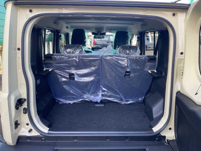 スズキ ジムニー ノマド FC 茨城県 2025(令7)年 0.1千km ベージュ 社外SDナビ/４WD/クリアランスソナー/アイドリングストップ/アダプティブクルーズコントロール/シートヒーター/ダウンヒルアシストコントロール/横滑り防止装置/レーンキープアシスト/オートライト/オートマチックハイビーム/衝突軽減システム/LEDヘッドライト/純正フロアマット/純正15インチアルミホイール/スマートキー